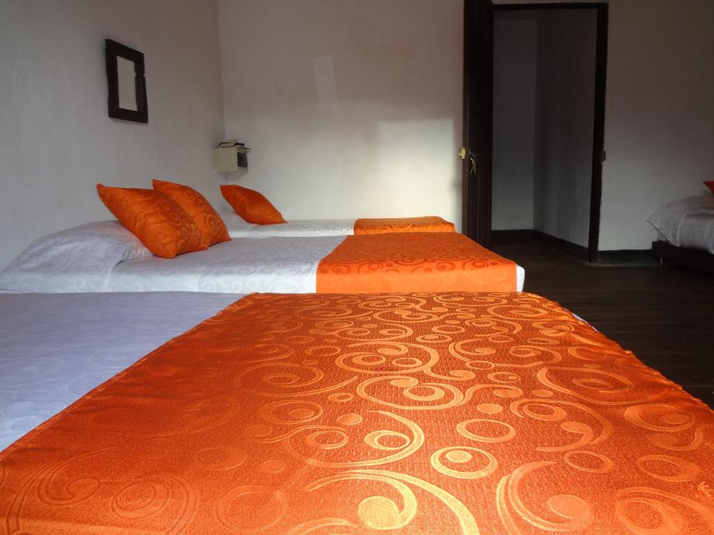 Raices Hotel San Agustin Pokoj fotografie